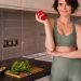Photo Of Young Woman With Vegetables At The Kitchen.